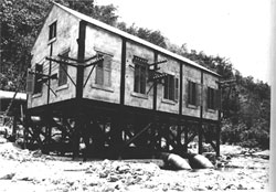 The power Station that housed the turbines which produced electricity. The pipes shown brought water from the reservoir to the turbines